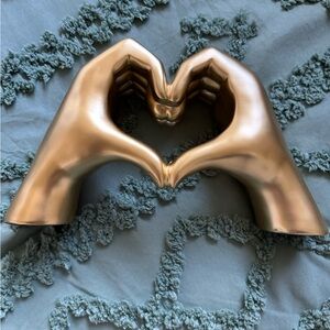 Gold Heart-Shaped Hand Sculpture